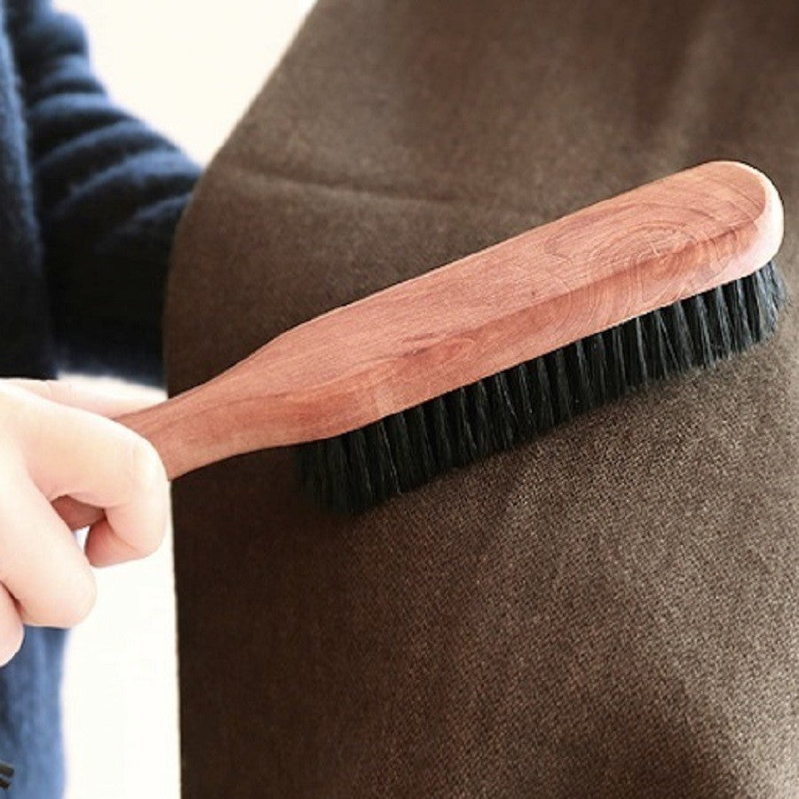 Timber handled clothes brush