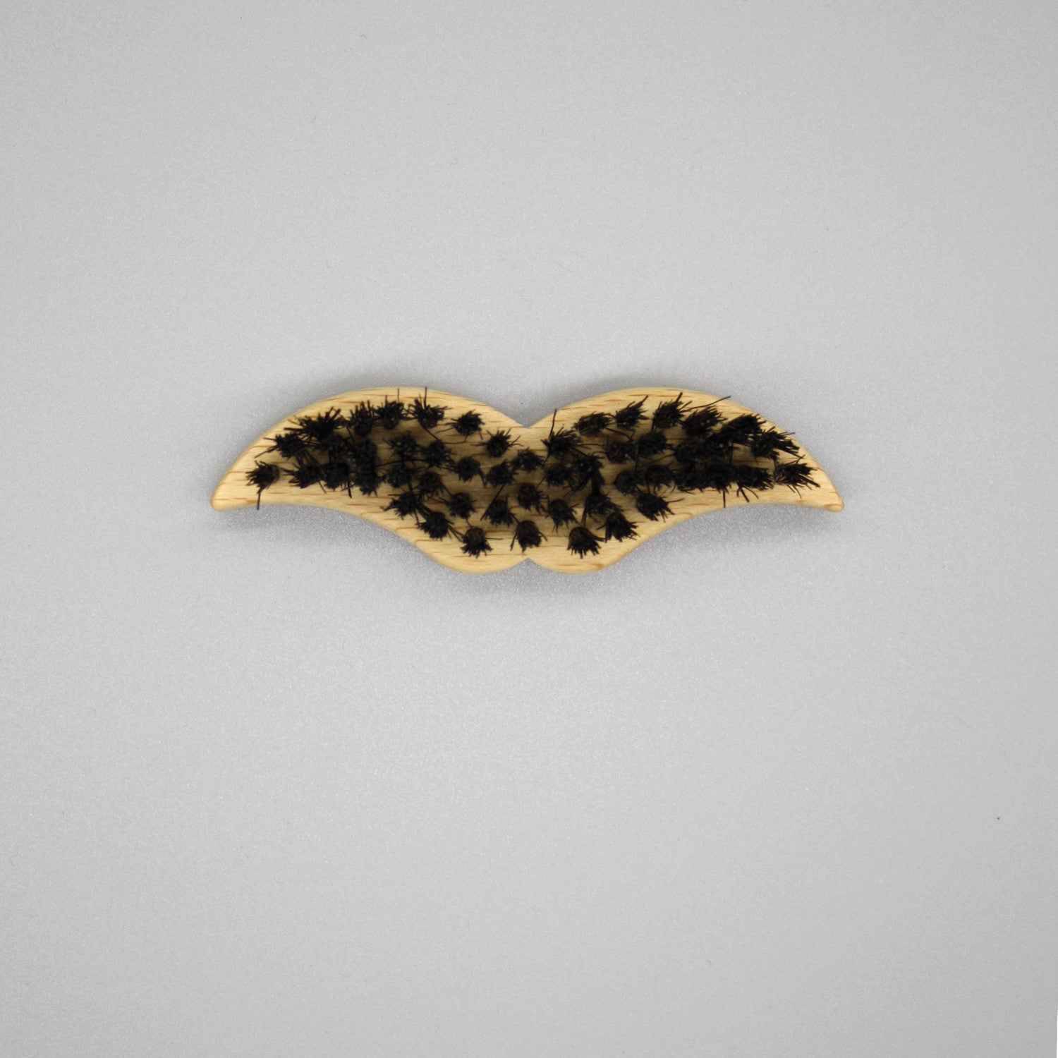 Beard Brush in a mini moustache shape