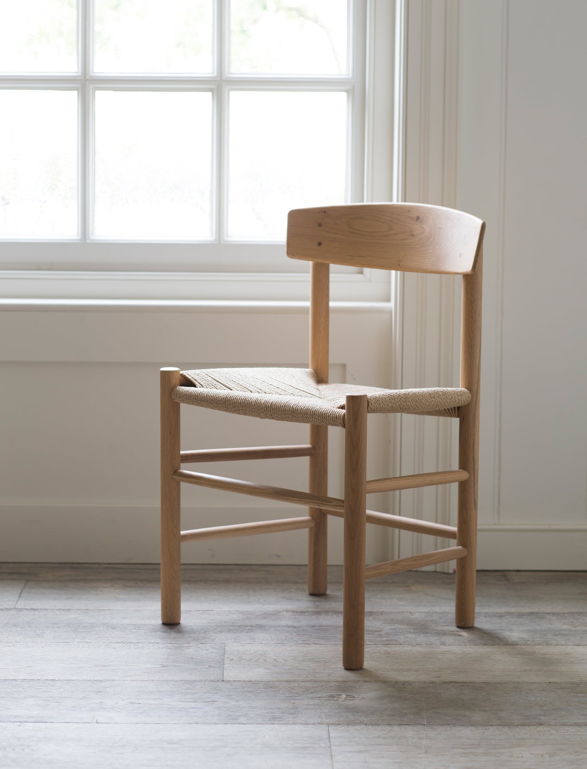 sustainable raw oak chair with woven papercord seat