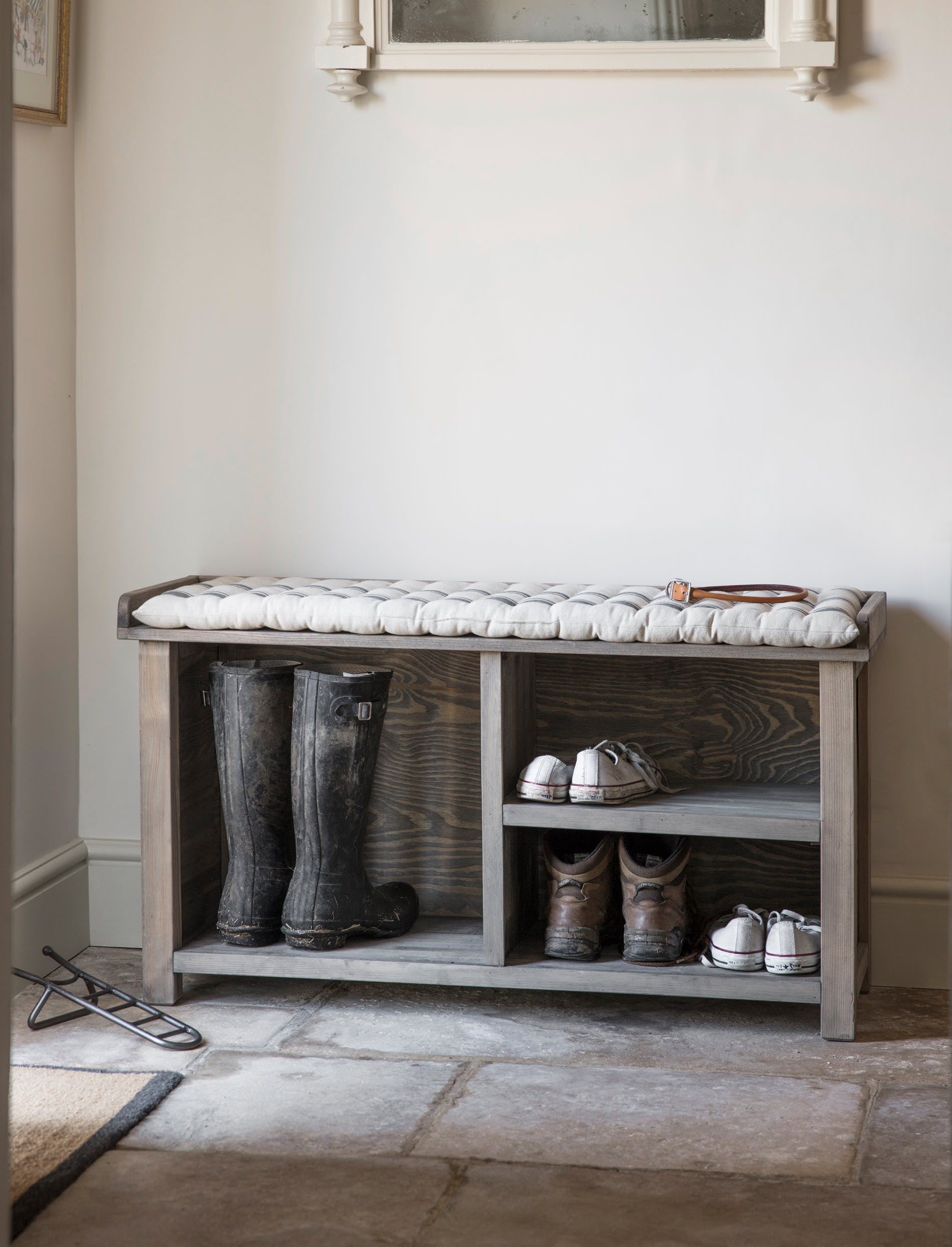 shoe storage bench with a seat pad