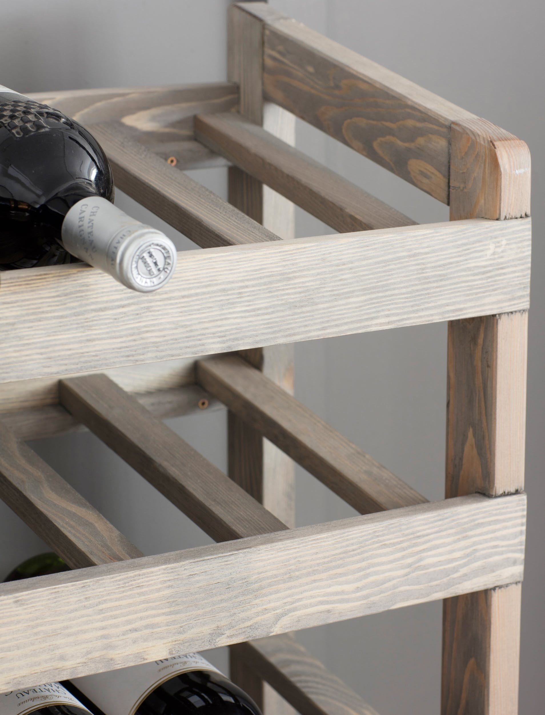 Wine Rack with clever design to keep the corks moist