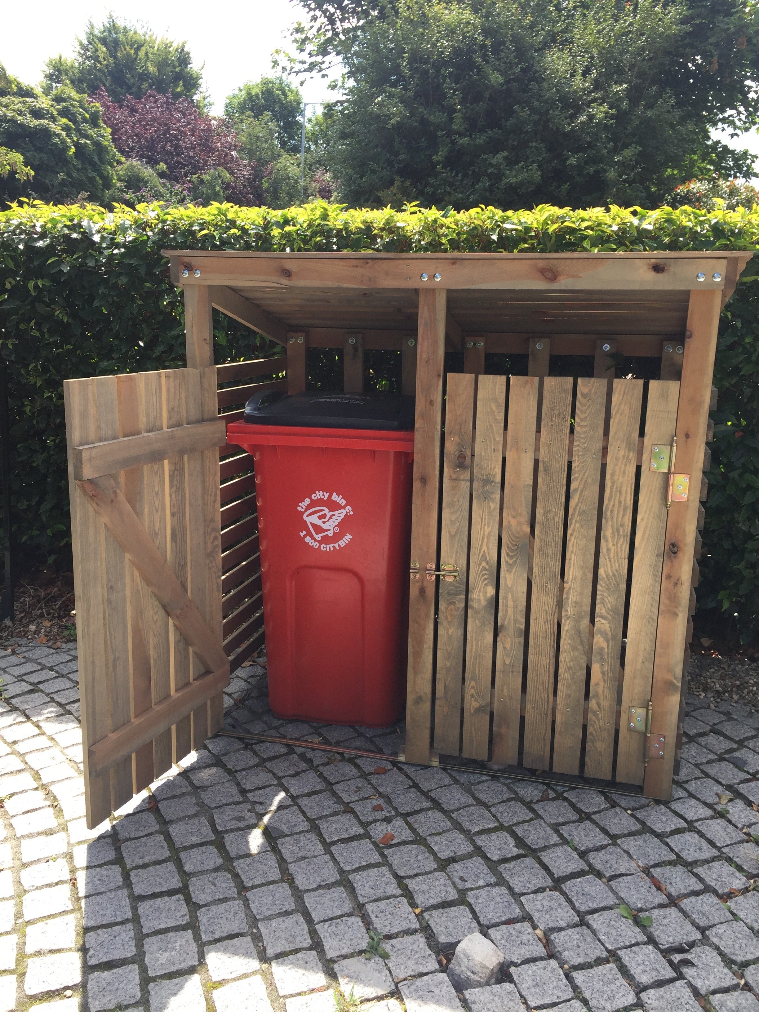 clever garden storage unit for your rubbish bins