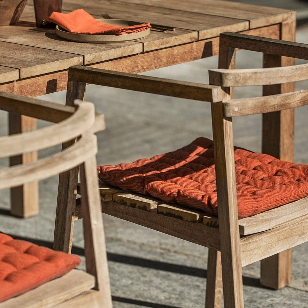 rust orange pepper seat cushion from the blue door