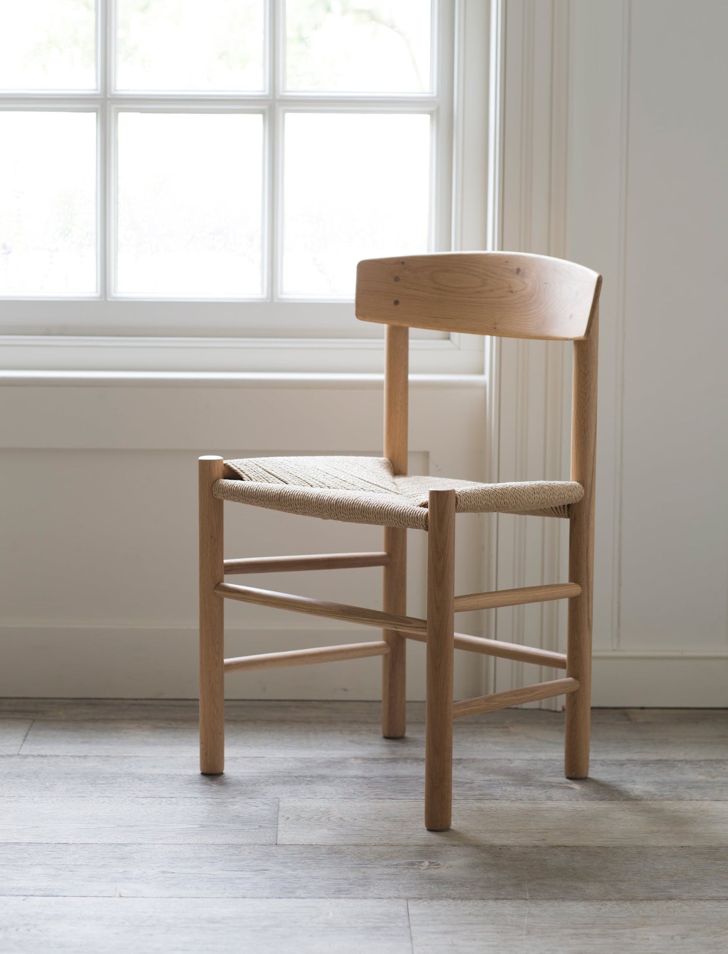 sustainable raw oak chair with woven papercord seat
