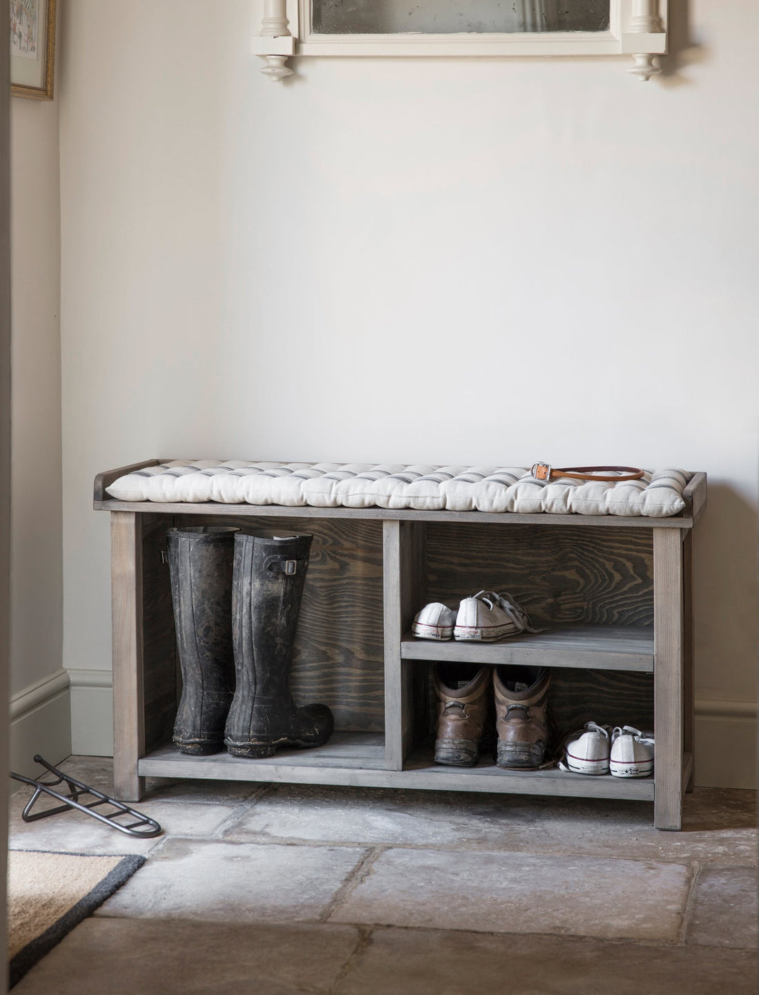 shoe storage bench with a seat pad