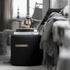 small black wool pouffe from sweden