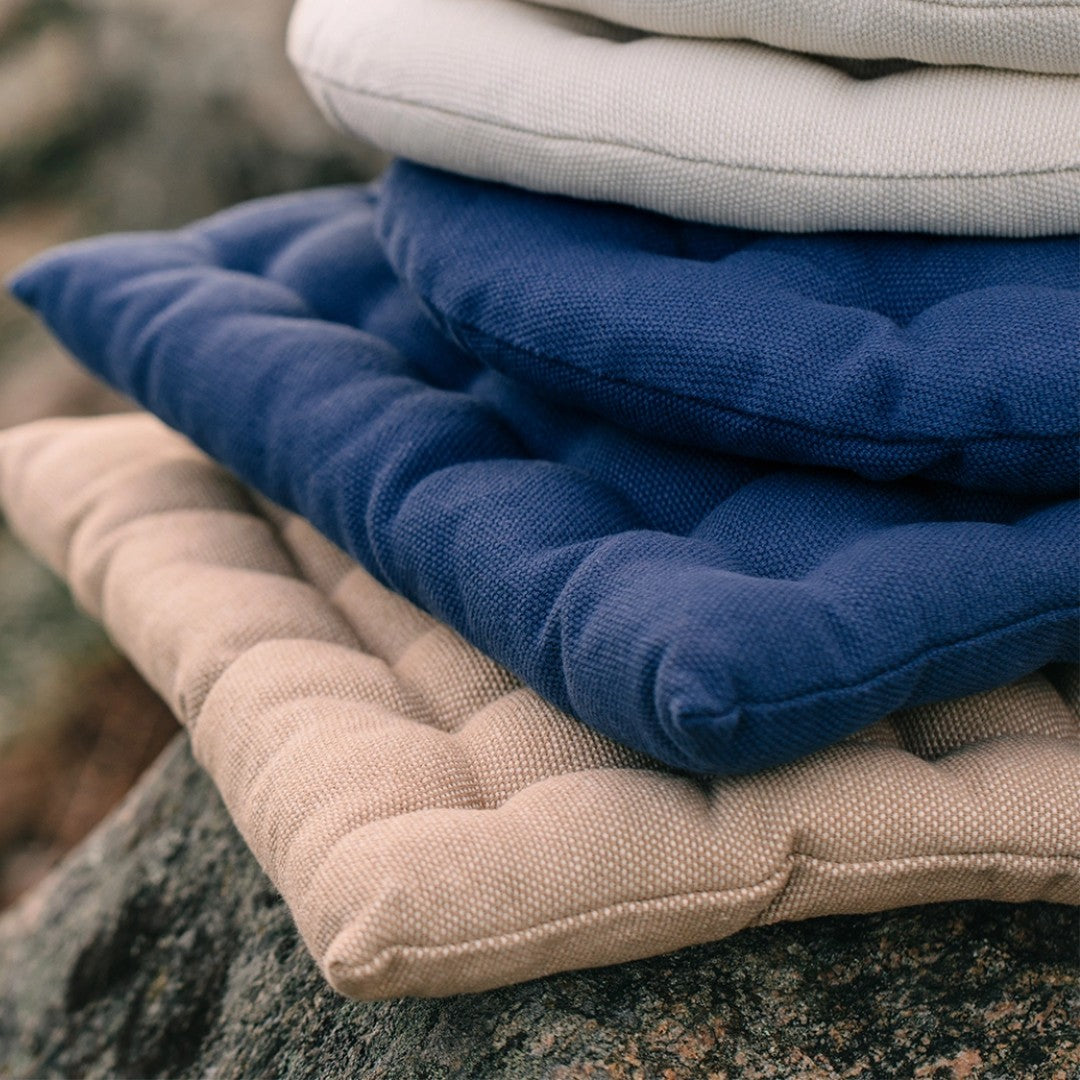 cotton seat cushion is dark navy blue