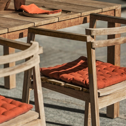 rust orange pepper seat cushion from the blue door